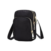 Studio image of the Crossbody Shoulder Bag, front-facing with clean lighting to highlight its sleek, compact silhouette and travel-ready build