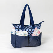 Eco-friendly 5-compartment diaper bag packed with baby essentials – lifestyle product image 01