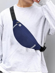 Lifestyle image of the Moon Bag worn across the body in an everyday setting, highlighting its curved silhouette, sleek profile, and hands-free design ideal for casual travel or urban movement