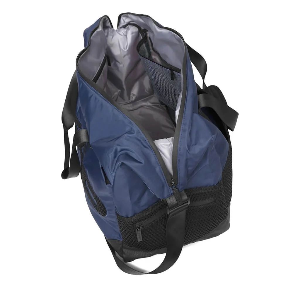 Studio image of the TDB01 small duffel bag shown unzipped with its top flap open, revealing the main compartment and organized interior—designed to highlight accessible storage and thoughtful internal structure