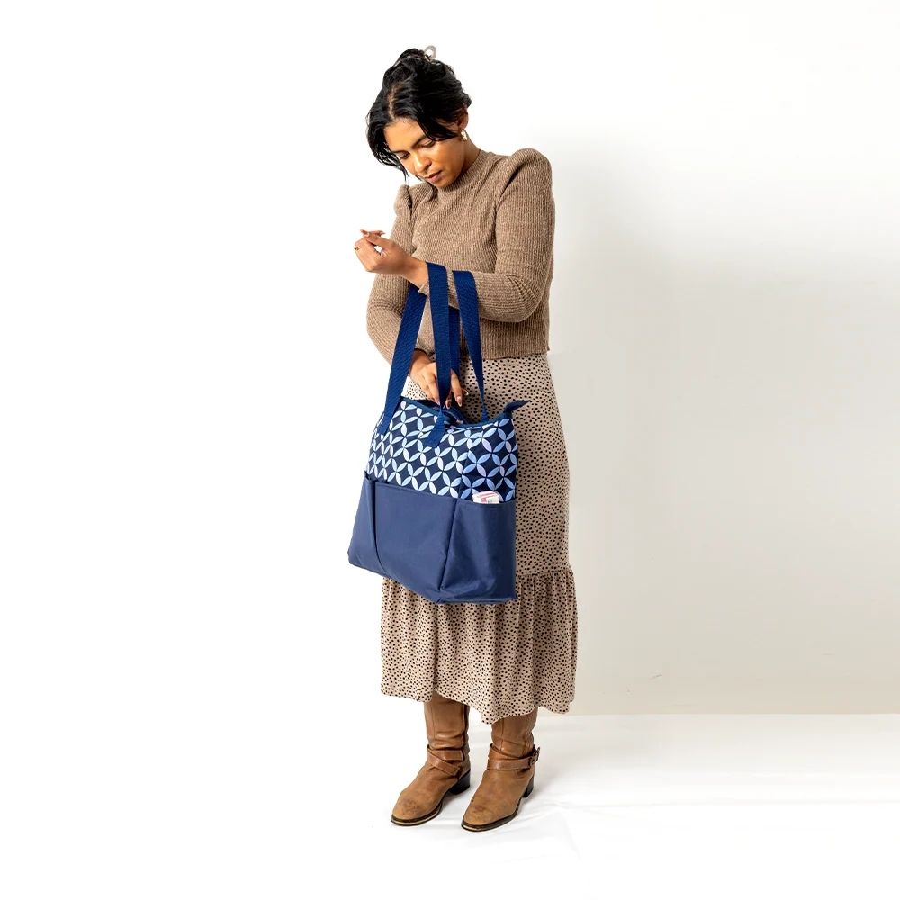 Eco-friendly 5-compartment diaper bag packed with baby essentials – lifestyle product image 04