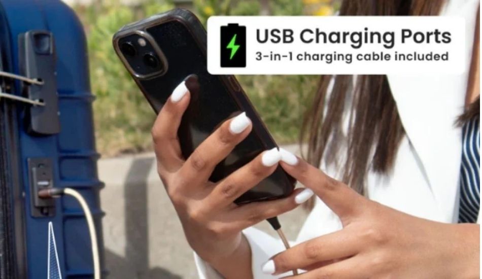 Lifestyle feature highlight image of the Santorini luggage showcasing its integrated USB charging port in use, emphasizing effortless, eco-minded travel convenience