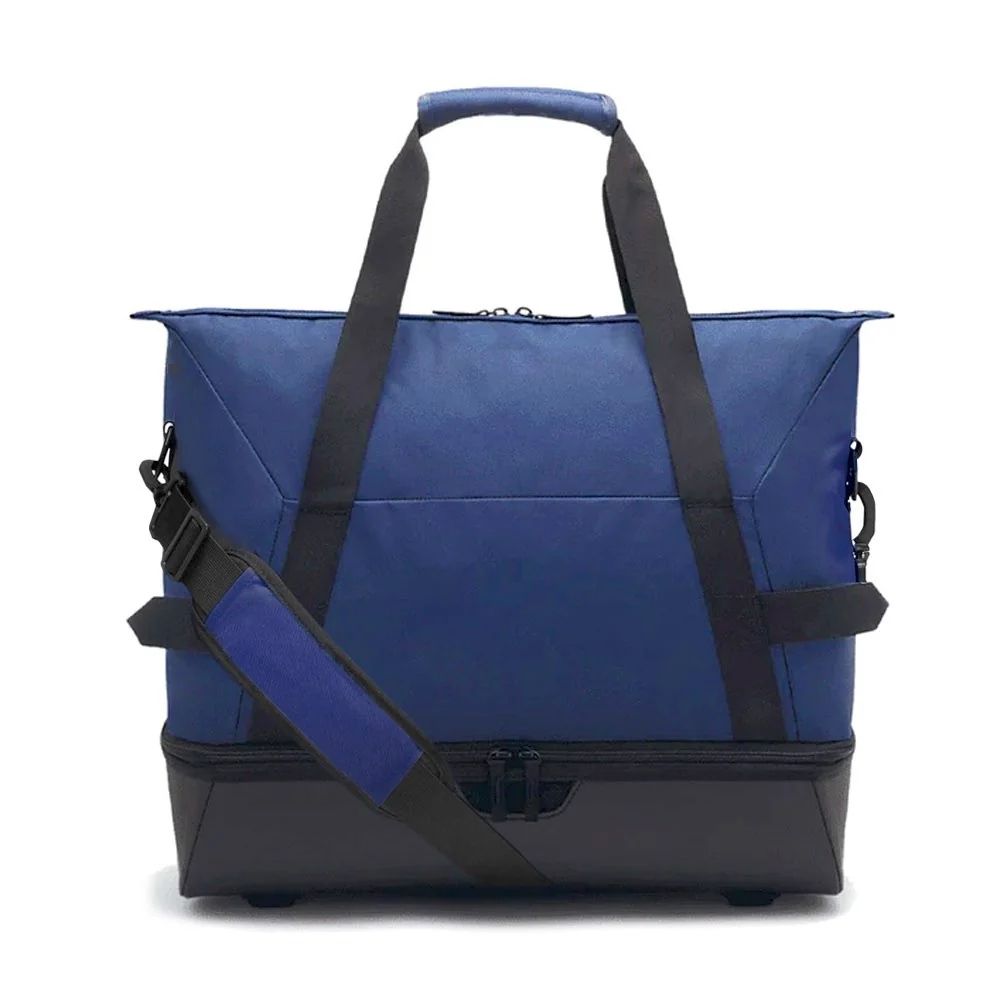 Studio image of the TDB01 small duffel bag shown from the front, highlighting its minimalist silhouette, compact structure, and zippered closure—designed for efficient, stylish carry